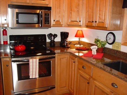 Kitchen with granite countertops.