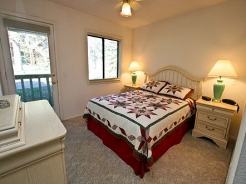 Queen bed in bedroom with great views