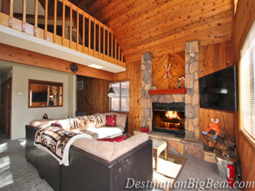 High vaulted ceilings and the loft area above the living room