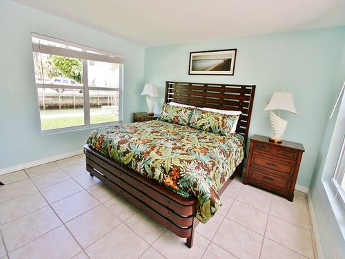 Large Master Bedroom with King Sized Bed and Canal Views