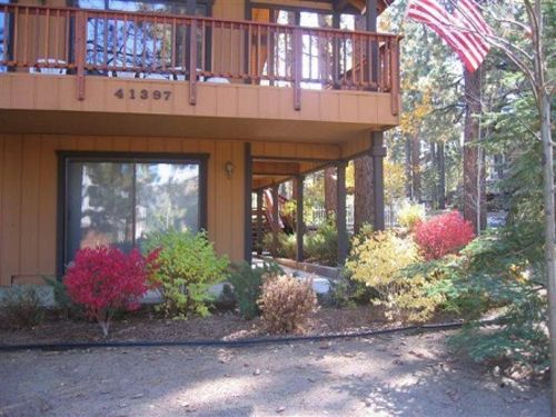 Sit back and relax taking in amazing lake views on the large wrap around deck