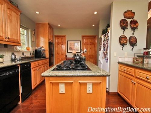 Full stocked kitchen with granite countertops