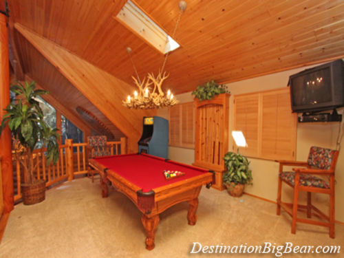 The welcoming great room is spacious with an open loft to the GAMEROOM