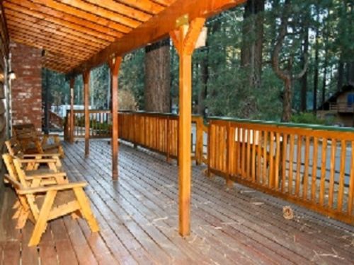 Relax on the expansive front deck enjoying a the mountain air