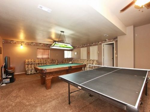 Have fun in the newly refinished gameroom including a POOL TABLE, PING PONG, and FLAT SCREEN TV with DVD player.