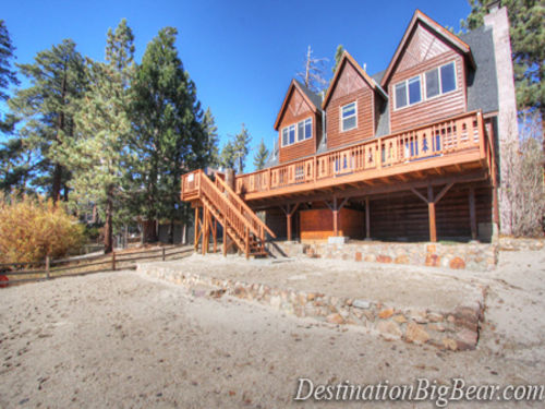The expansive deck is perfect to barbeque on and enjoy dinner on the outdoor patio set.