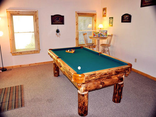Foosball Table and Pool Table in the Downstairs Game Room