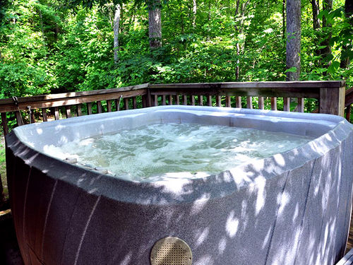 The Private Hot Tub Secluded by Trees.