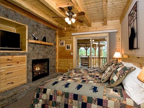 The main floor master suite has a King bed, gas fireplace, and Flat Screen TV with DVD player. The private bath has a jetted bath tub. There is a half bath on the main floor just off the kitchen. 