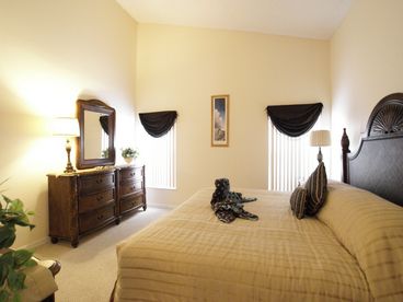 Master Bedroom with flat screen tv, walk in wardrobe and en-suite with walk in shower and garden bath.