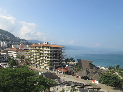 Plaza Dorada is the beachfront condominium pictured in this photo.