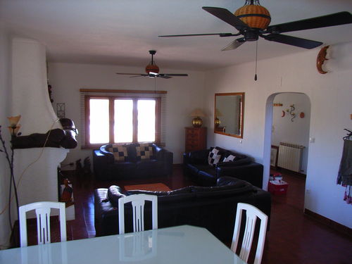 Big living with 3 2-seater sofas, SKY sattelite TV, Fireplace, Dining table with 8 chairs, Dvd\'s , Games.