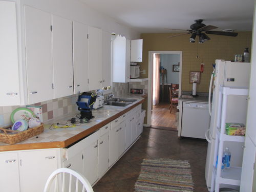 We have a full eat-in kitchen and separate dining room  Both rooms have patio doors overlooking one lake.