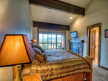Top Floor Master Bedroom with Gas Fireplace, King Bed, Deck Access, Private Bathroom