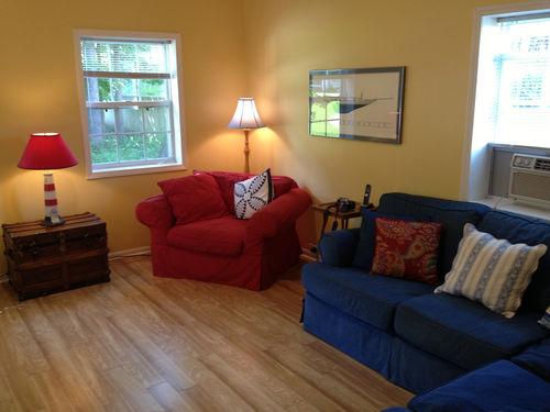 Living room features flat screen TV with HD cable.  WiFi internet access included.