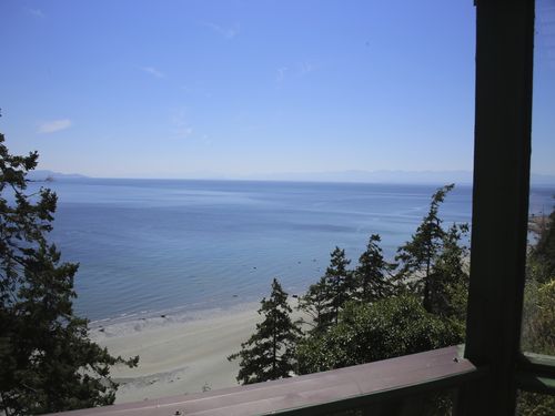 View from terrace.  It takes 3-4 minutes to be on the beach with soft sand sifting through your toes!