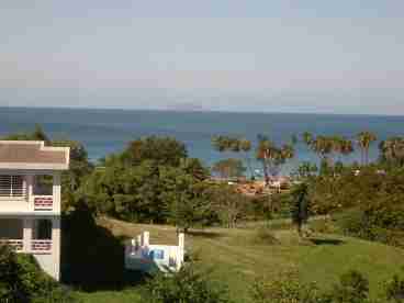 This a shot from the balcony. If you look closely you will see the island of Desecheo