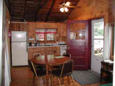 Knotty pine, ceiling fans, new bathrooms with shower in all cabins.