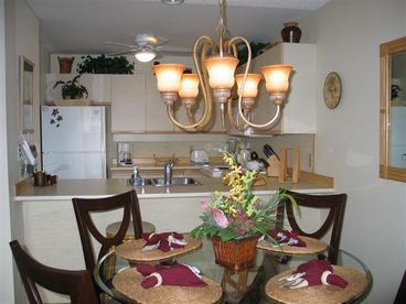 Fully Stocked Kitchen with New Dinning Table
