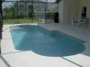 Large heatable pool with selection of luxury pool furniture. There is and outside washroom and also a shower on the deck.