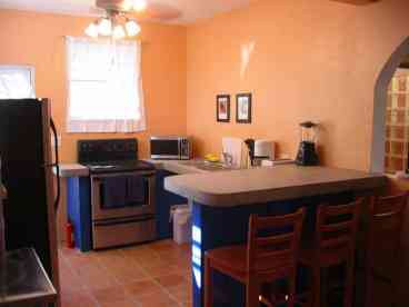 The eat-in kitchen is fully-equipped with stainless steel fridge, stove and dishwasher, plus all the amenities you'll need to prepare and enjoy meals.
