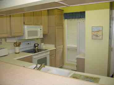 Fully stocked kitchen with all appliances and utensils you would expect