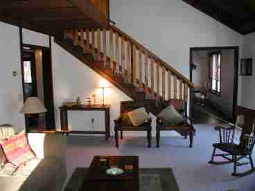 Living Room with Staircase