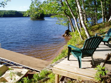 Clear water, sandy swim area.  Cabin comes with 2 canoes, a kayak and a paddleboat.