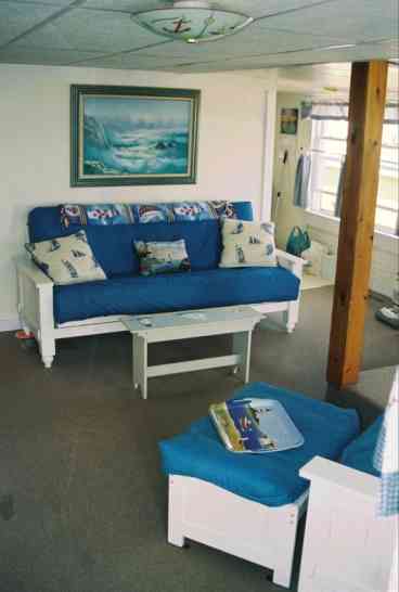 livingroom with ocean views, 27 inch tv/vcr/dvd/cable