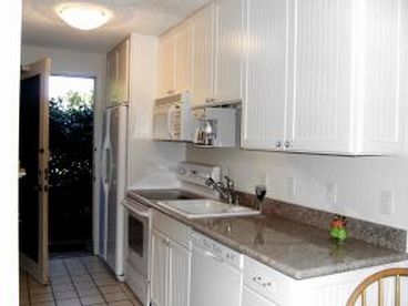 This is a picture of our newly remodeled kitchen. We have a side by side refrigerator, ceramic cook top stove, and granite counter tops!!!