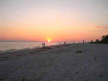 Sunset view from the beach in front of the unit