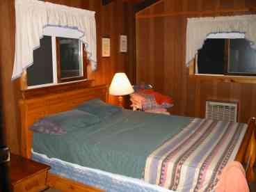 Upstairs bedroom has queen sized bed