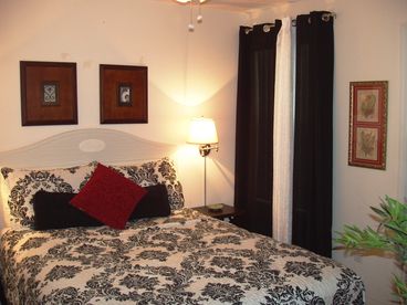 The queen\'s room is fit for the queen herself!  Have the most relaxing nights sleep in your new queen bed complete with a new flat screen TV, celing fan, and walk-in cliset. The deor is gorgeous.