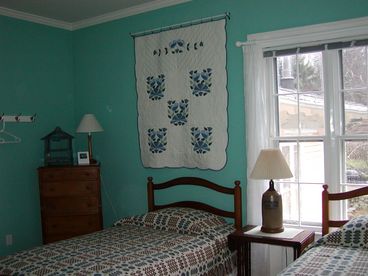 Twin beds & bathroom with tub on the NW corner. A quiet favorite.