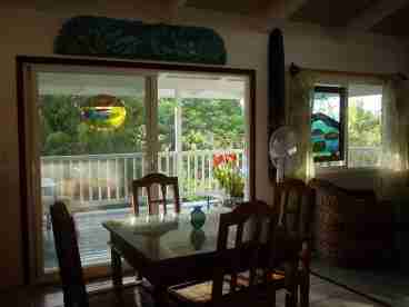 Dining area with livig room on the right.