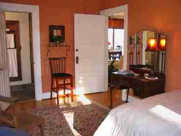 This is our only downstairs room, it has a queen and a twin with a private bath and a garden window in the bathroom. Each of our rooms is named for one of the trees which grows on the grounds.