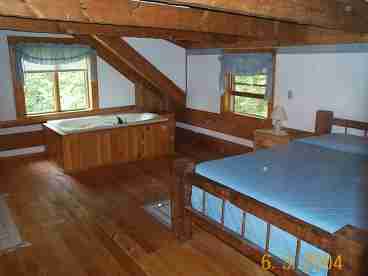 Roomy upstairs bedroom with Jacuzzi