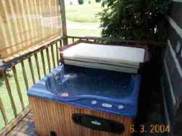 Relax in the HotTub on the back porch.
