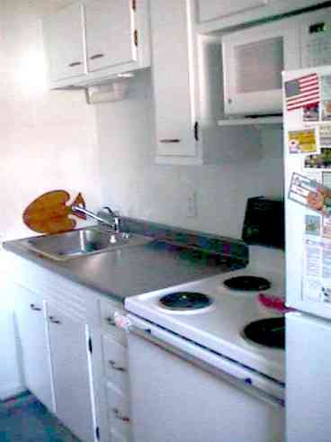 Freshly painted with NEW counter top. Fully Furnish kitchen with stove/oven. microwave, blender, coffee pot, etc.