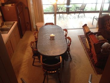 View of Kitchen and Living Room towards Screened-in Porch