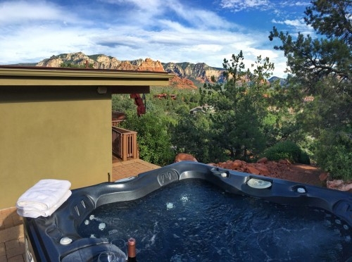 Large hot tub with super red rock views.