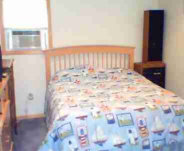 master bedroom , with color tv and ac