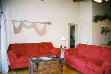 Living Area with Gas Stone Fireplace and view of Table Rock Lake