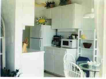 Full sized kitchen with all appliances, pots & pans, & utensils. 