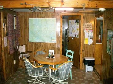 Dining room, maps of the area and that rustic Adirondack charm. 