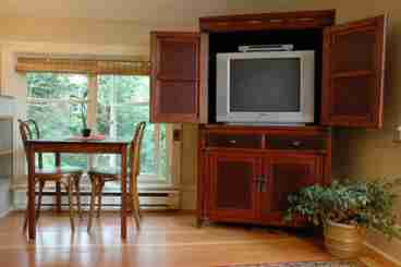 Antique Chinese cabinet opens up to a 27