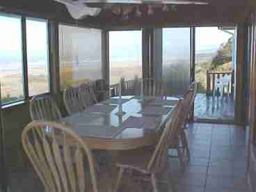 Enclosed Sundeck on Ocean side of house, Oak Dining Table, seating for 8 or more!