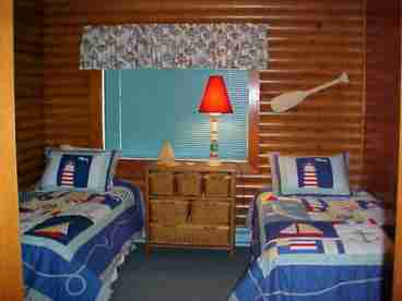 Original Log Cabin walls in Twin Guest Bedroom