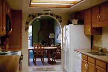 Kitchen looking into Dinning Room and Living Room