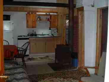 A view of the kitchen/livingroom area from the door.